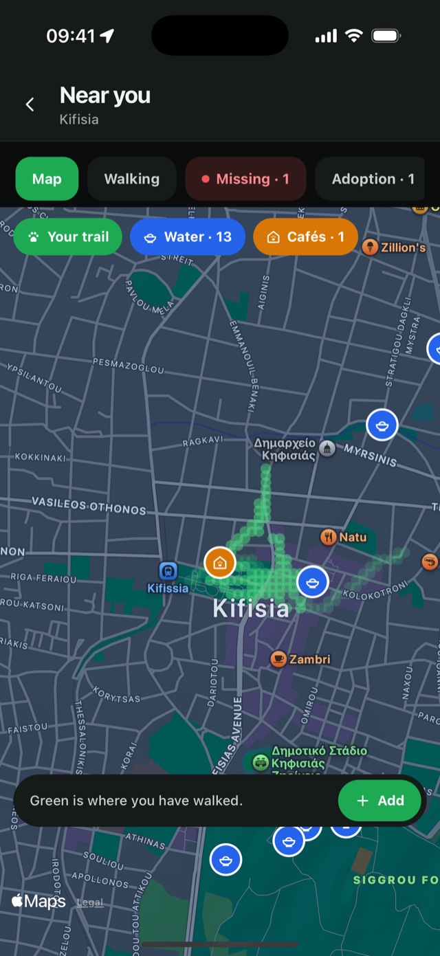 The Zoopi map over Kifisia: green cells on every street this dog has walked, pins for water bowls and cafes that take dogs, and the layers you can turn on.